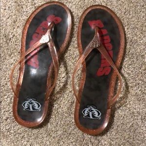 Size 7/8 Wisconsin badgers flip flops